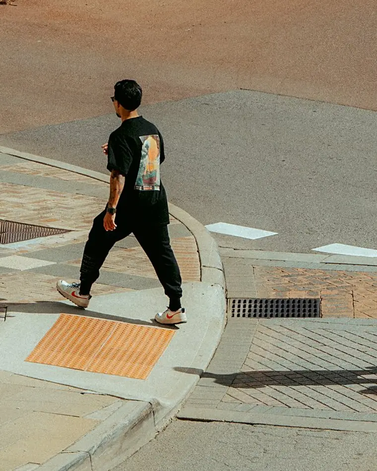 The tee worn, wide crop.