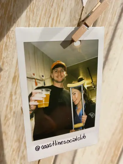 A polaroid from the stand, pegged on the line.