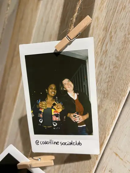 A polaroid from the stand, pegged on the line.